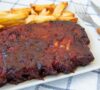 Cómo hacer unas costillas con salsa barbacoa al horno de rechupete